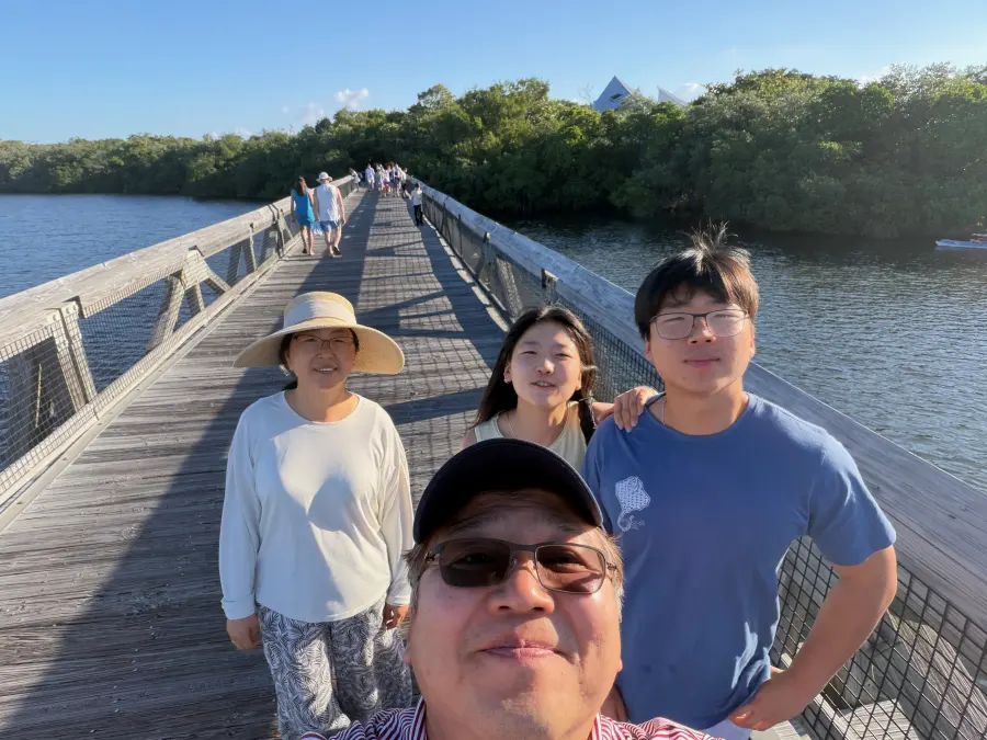 Daniel Cha with family outdoors